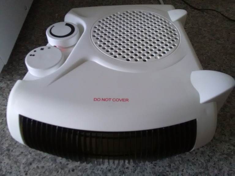 ELECTRIC FAN HEATER *LIKE NEW* CONDITION UP TO 2KW OUTPUT 