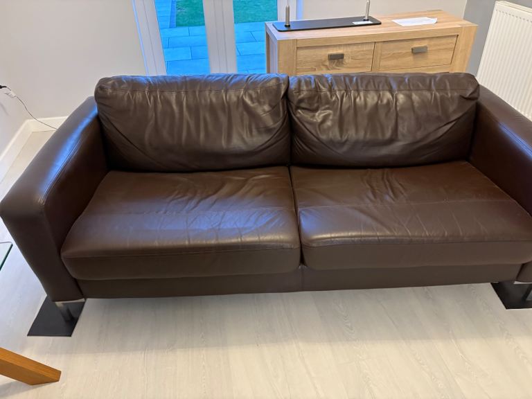 2 x brown leather sofas