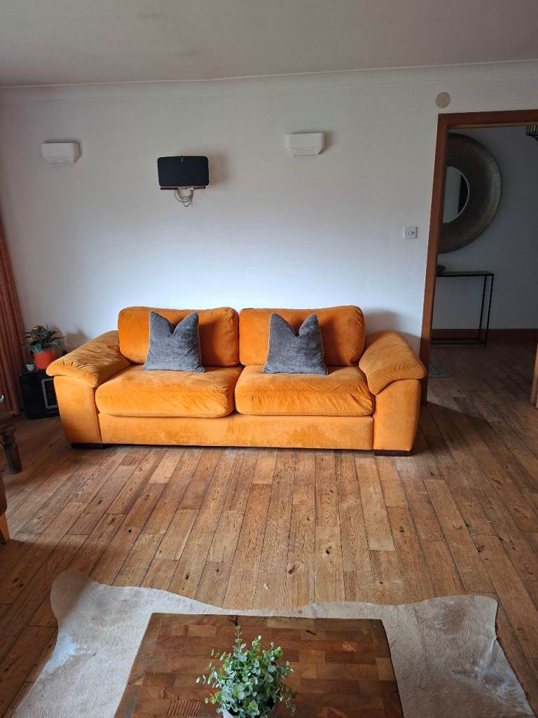 Orange velour large sofa