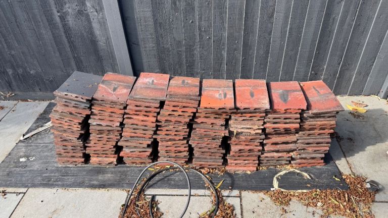 200 unused roofing tiles