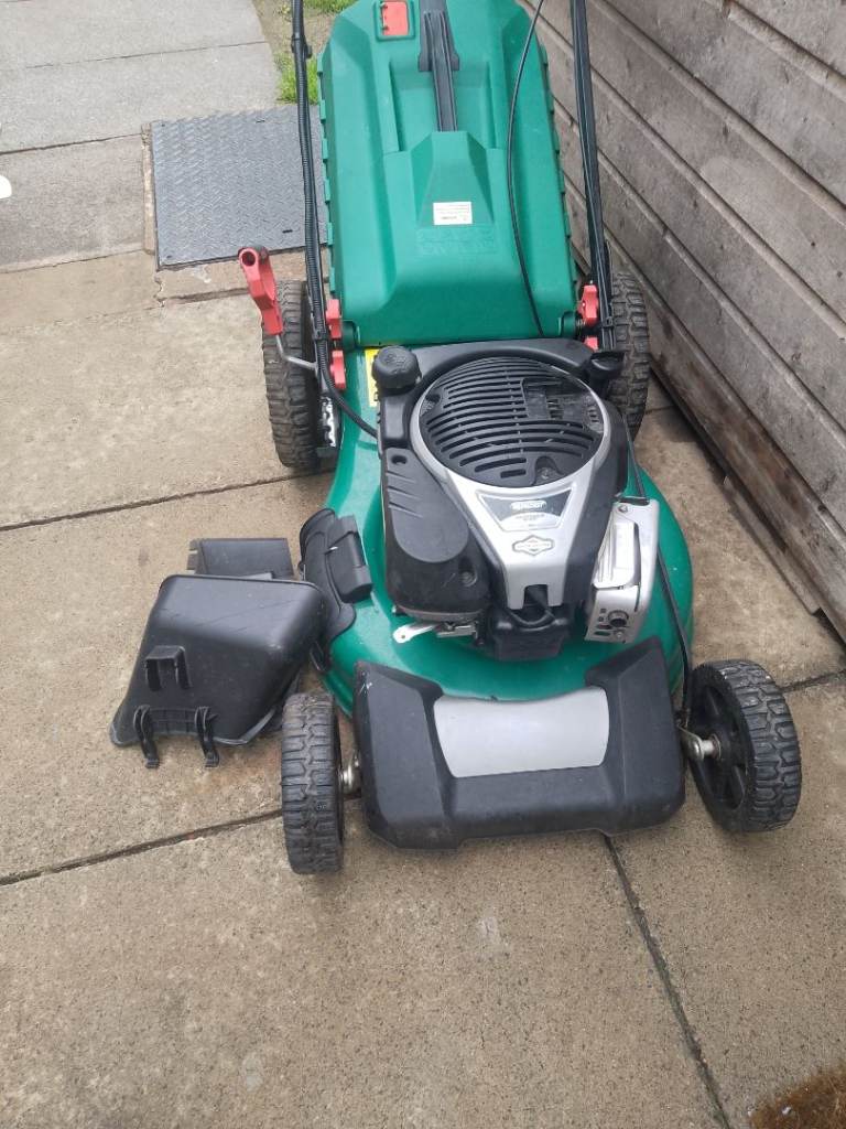 23"Qulcast electric starting mower with Briggs and Stratton engine 