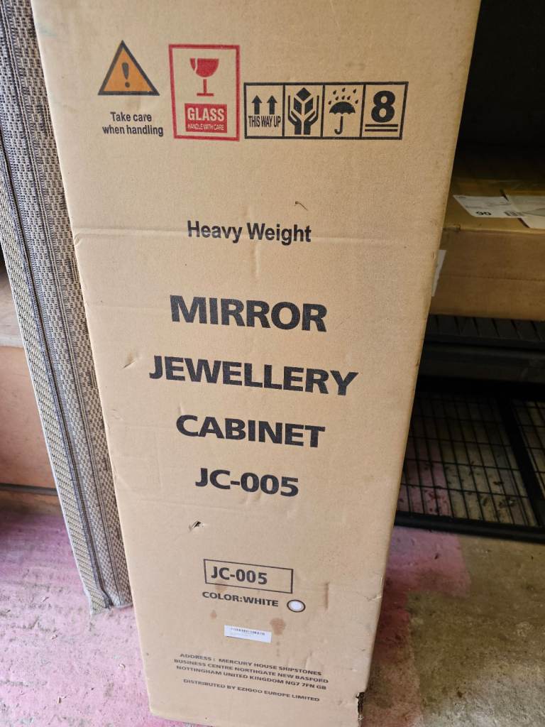 Jewellery cabinet new in box.