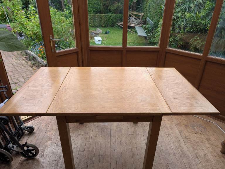 Fold out pine dining room table