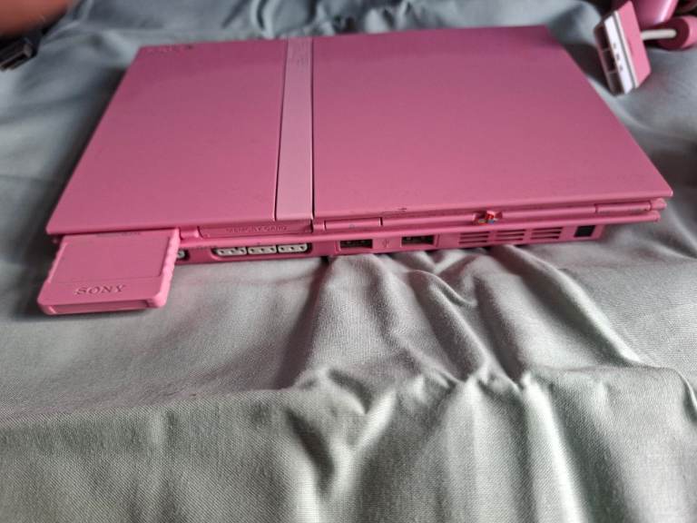 Rare pink ps2 with lots of games