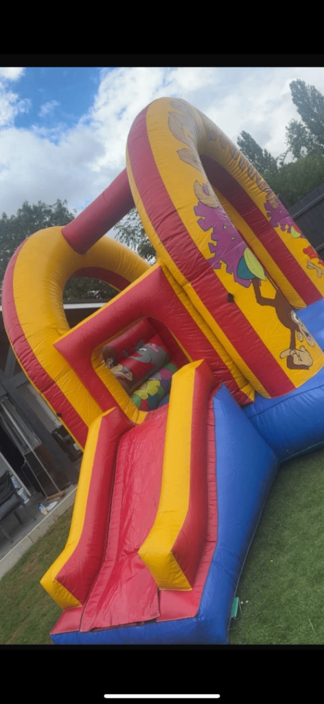 Bouncy castle with slides Matt’s and blower 