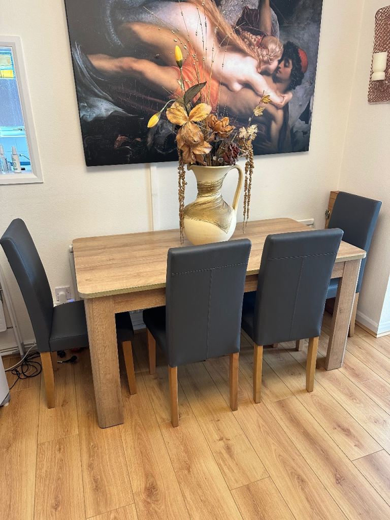 Wooden Extendable Dining Table with 4 Grey Chairs ( as new ) 