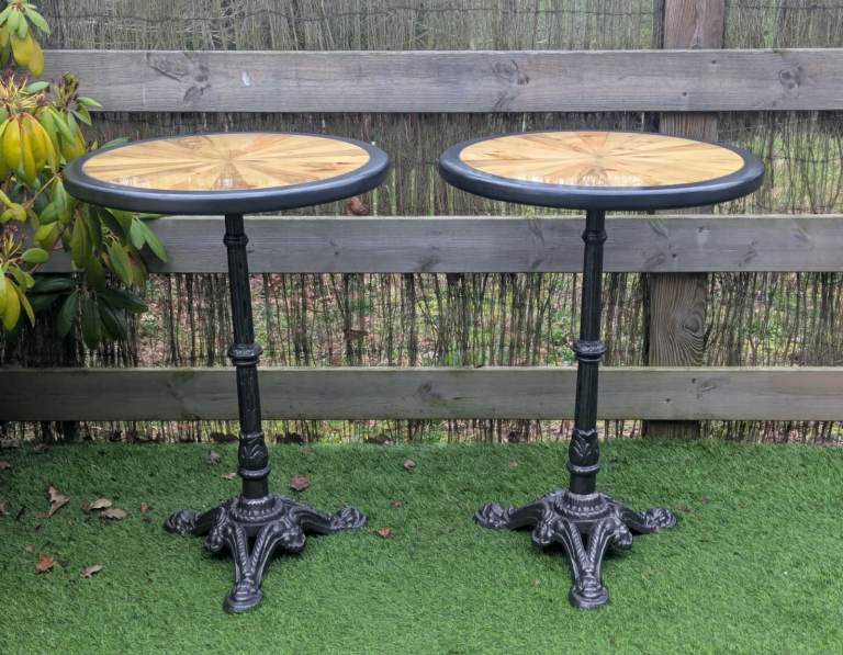 Pair of cast iron pub poseur tables