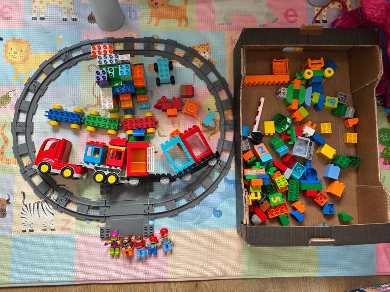image for Lego duplo bundle including Figures , track train and random bricks 