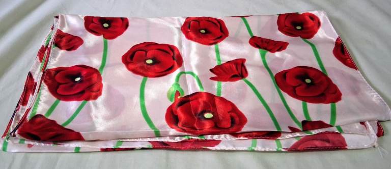 NEW BEAUTIFUL SILKY POPPY LONG SCARF.  SIZE 66” X 14”. 
