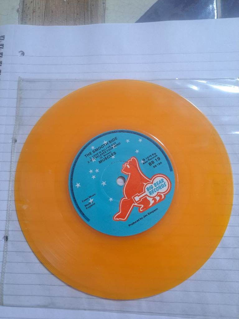Muscles - The Smooth Side/The Rough Side Oange 7-inch Vinyl Record