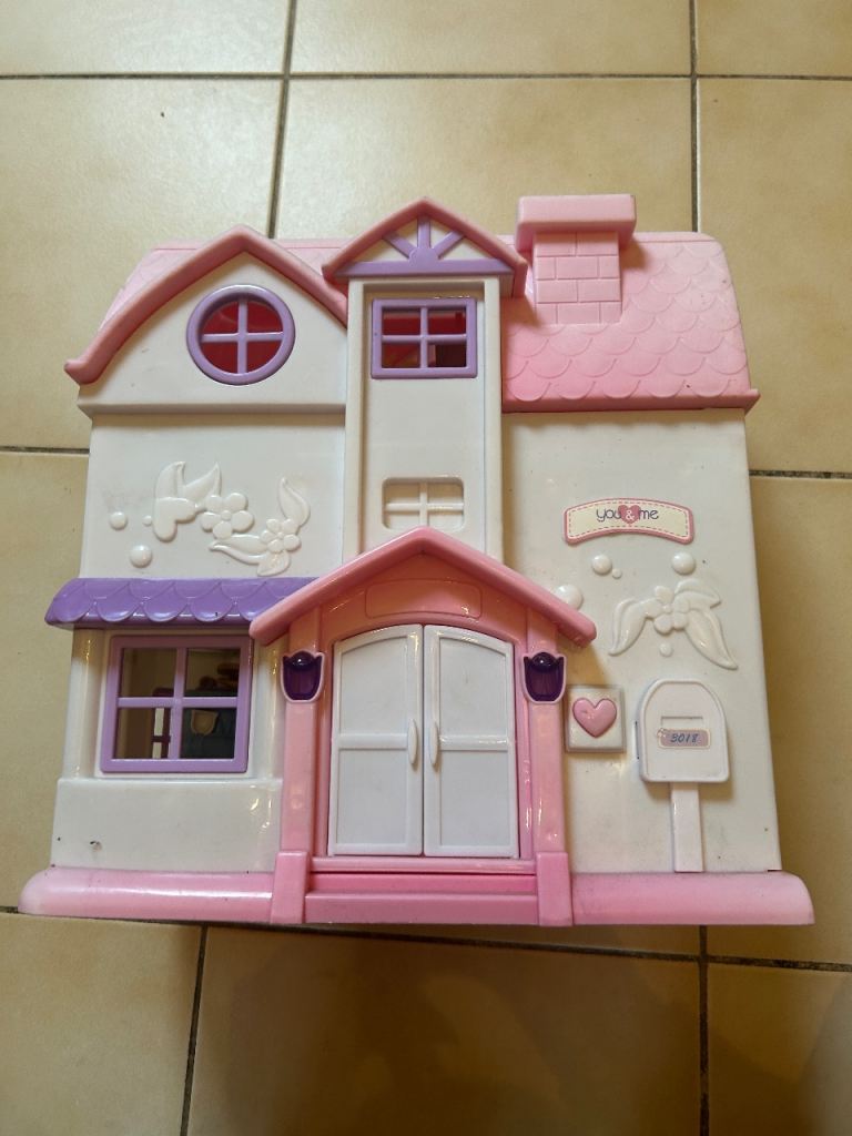 Pink Plastic Dollhouse with Furniture and Dolls