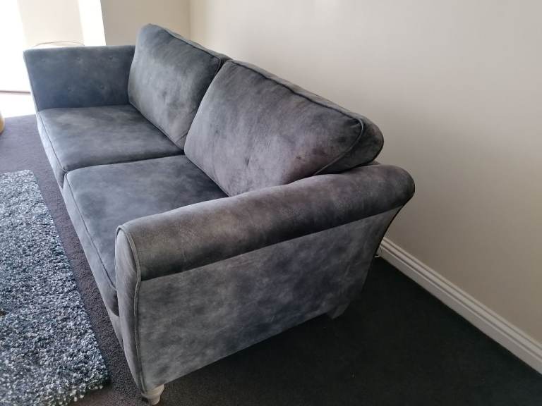 Moleskin sofa and footstool with storage 