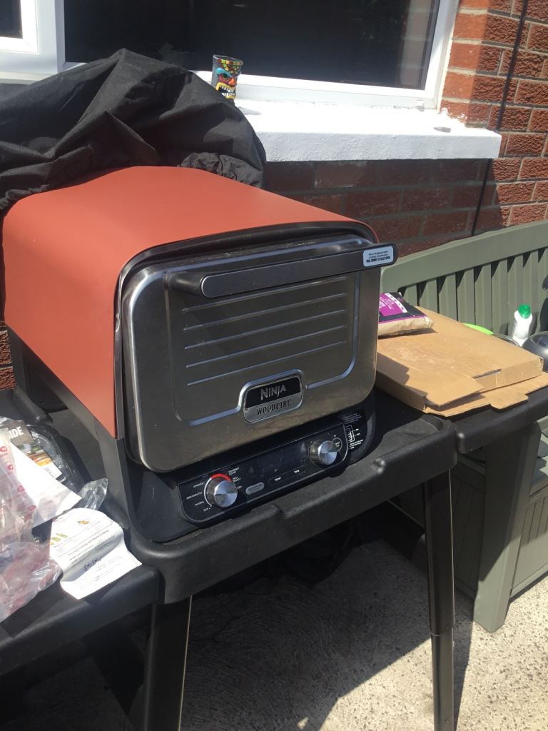 Ninja Woodfire 8-in-1 Electric Outdoor Pizza Oven Like new  with stand other products 2 covers