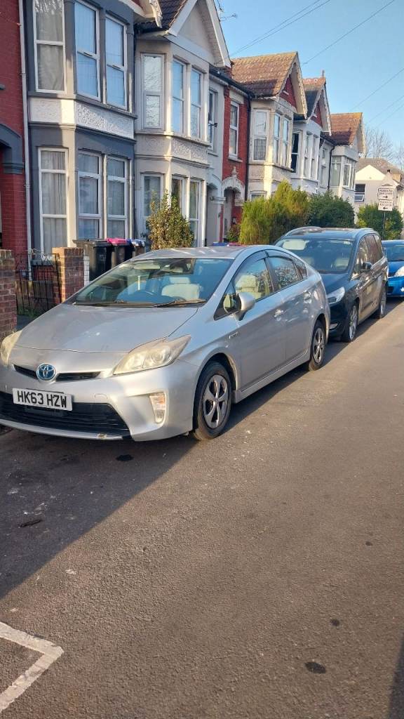 Prius in decent condition and low miles