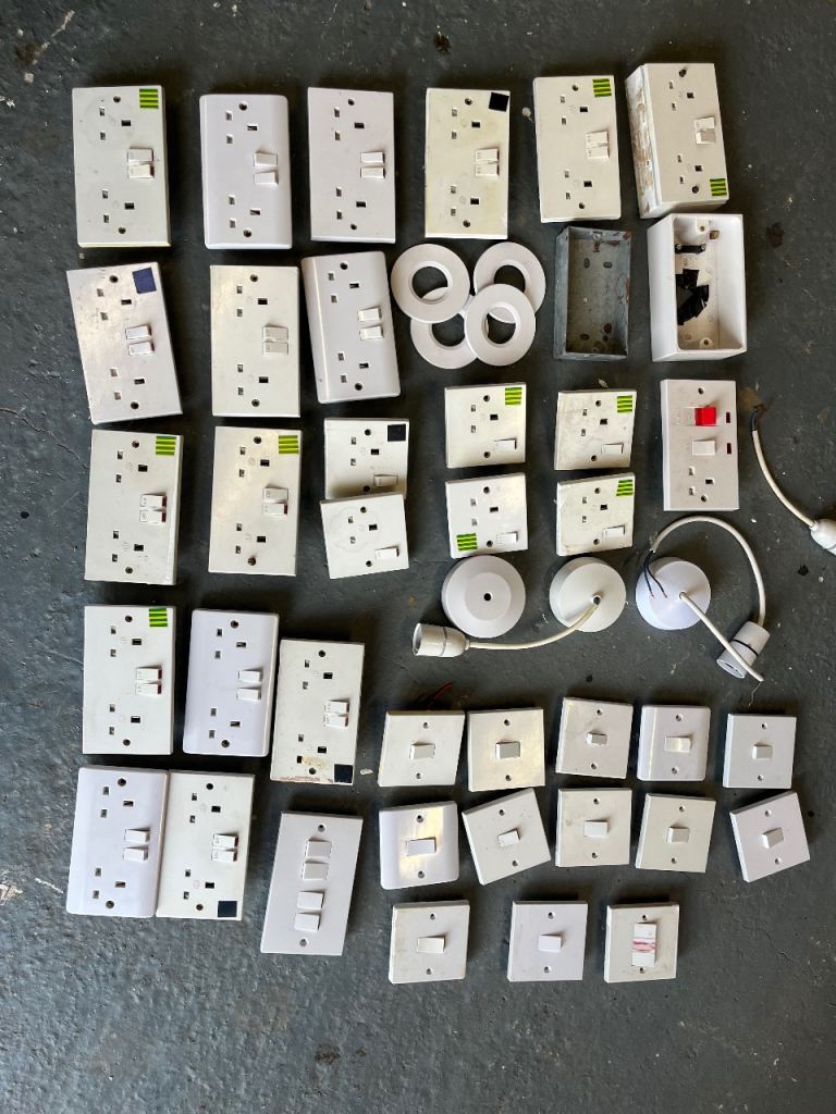 Various electrical plug sockets switch switches and fixings