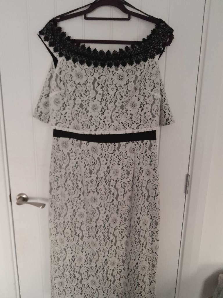 Stunning Wedding guest dress. Ladies black and white bardot lace dress