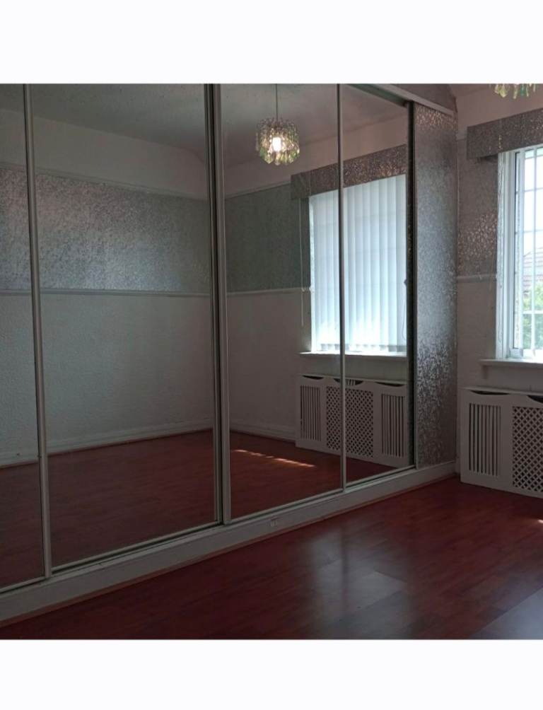 Sliding mirror wardrobe doors