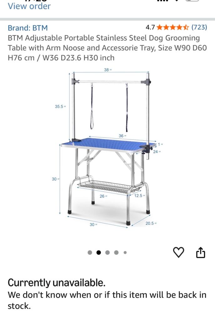 Dog grooming table