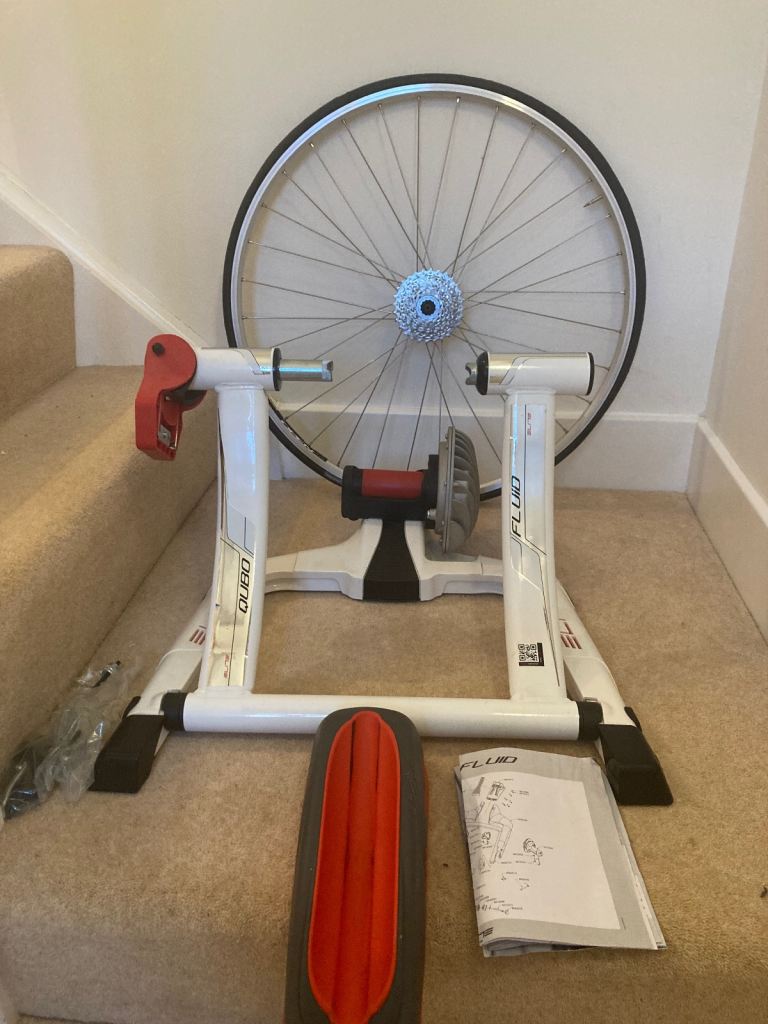 image for Qubo fluid elite indoor bike turbo trainer + trainer wheel 
