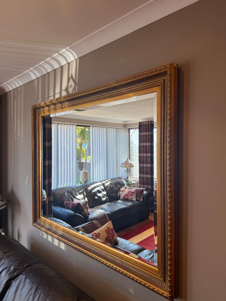 Ornate Antique gold mirror