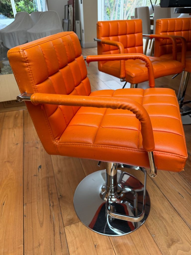 Orange Bar Stools with Chrome Base – Good Condition, Set of 4