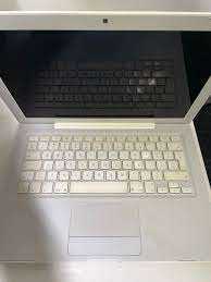 Apple MacBook A1181 White 13in Screen Notebook + Charger : For Spares & Parts