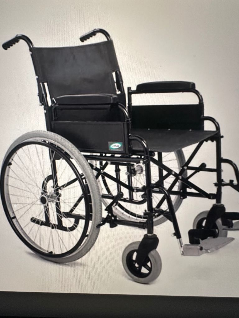 LOMAX quality wheelchair - basically new 
