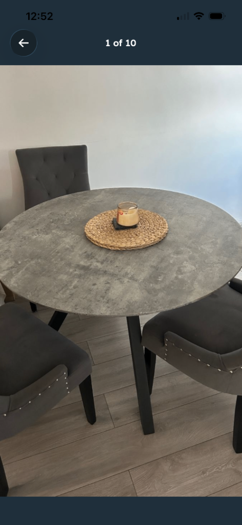 Grey round table and chairs