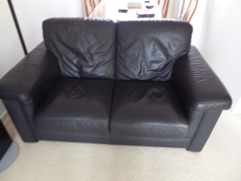 Klaussner Black Leather Suite consisting of 3 Seater Sofa-bed + 2 Seater sofa + matching stool.