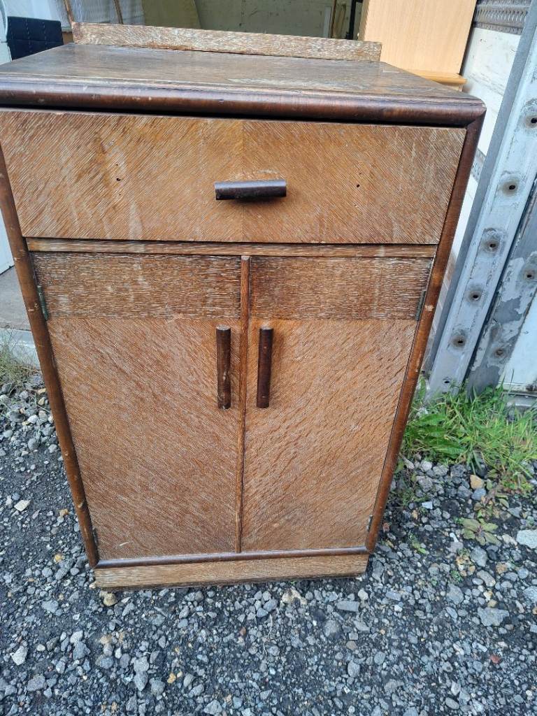 image for brown wood unit with drawer at the top and cupboard at the bottom