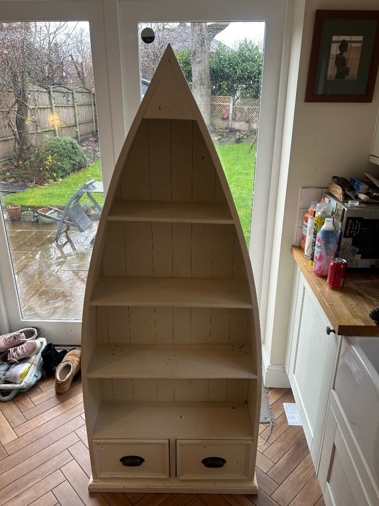 Boat shaped bookcase 