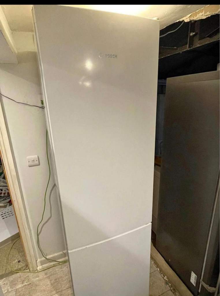 Very Large Bosch Fridge Freezer White  In excellent working order and overall condition Clean inside