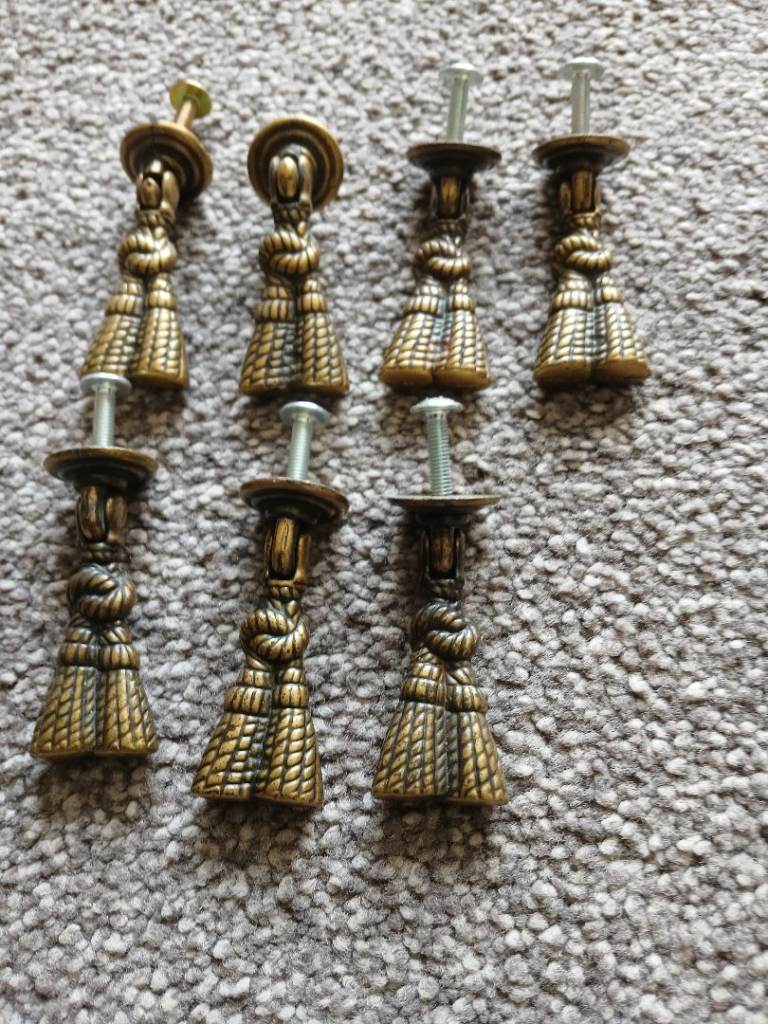 Set of 7 antique brass handles 