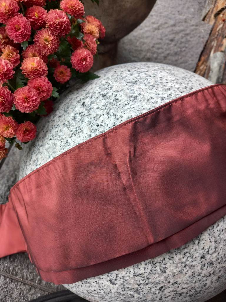 Rust sateen curtains pencil pleat