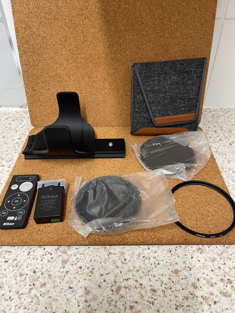 Nikon P1100 accessory bundle. QR mount, battery, filters