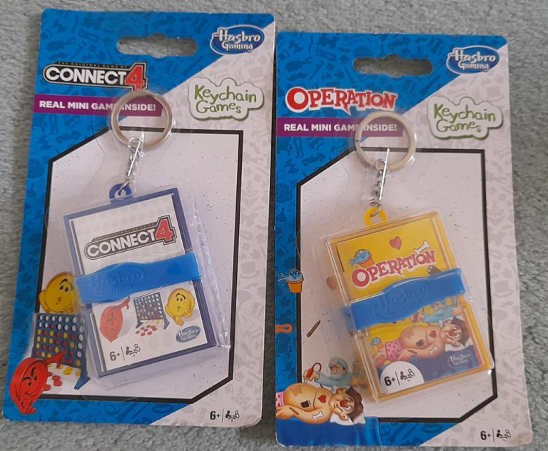 Hasbro Connect 4 and Operation mini keychain  games.
