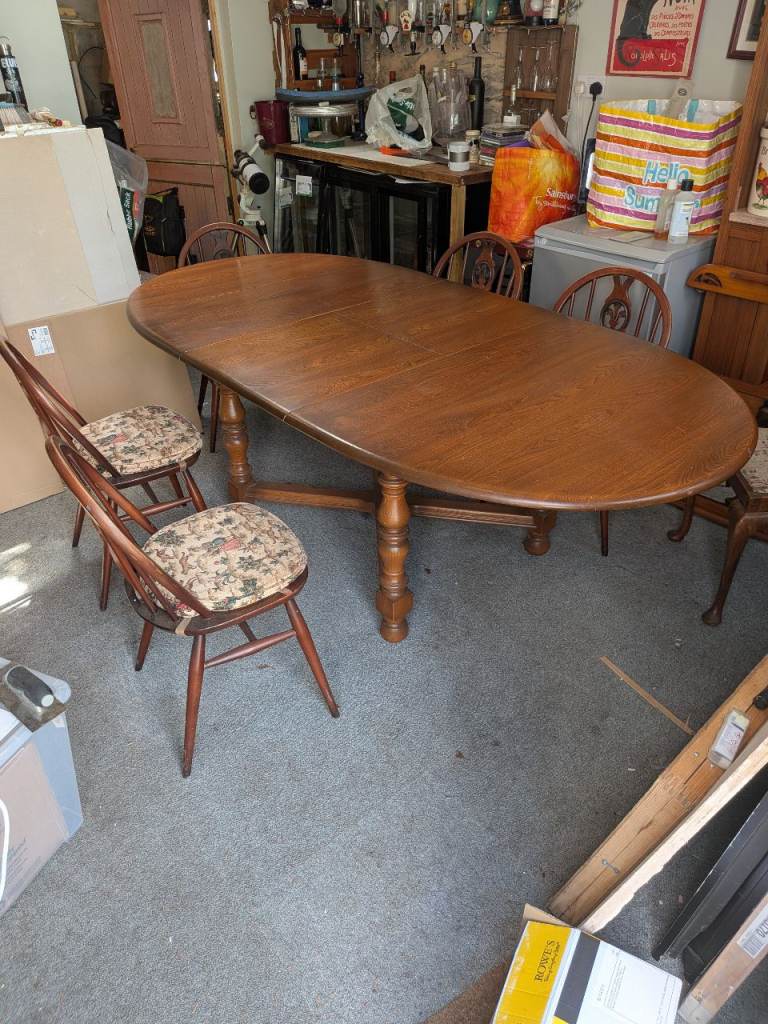 Ercol extending dining table and chairs