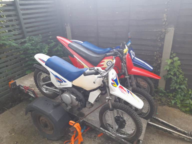 Petrol kids motorbikes and triple trailer