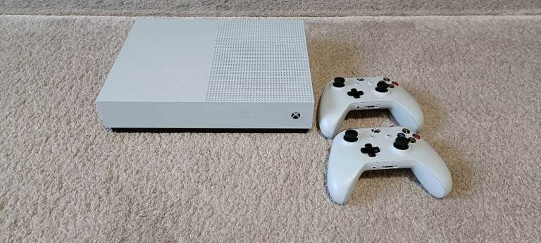 Xbox One S 1TB All digital with two controllers and with few games, brand new like as hardly used no