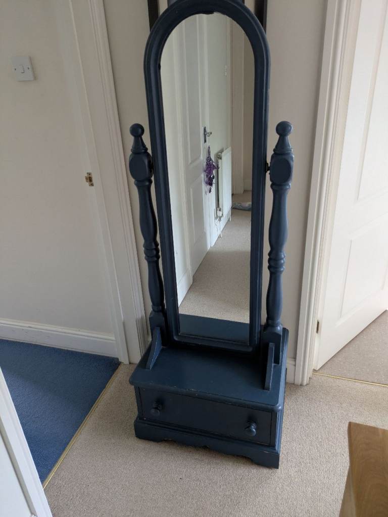 Heavy solid wood cheval mirror with one drawer painted in a midnight blue.