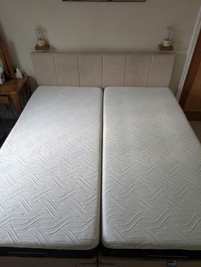Super king-sized Tempur dual mechanical adjustable bed with mattresses