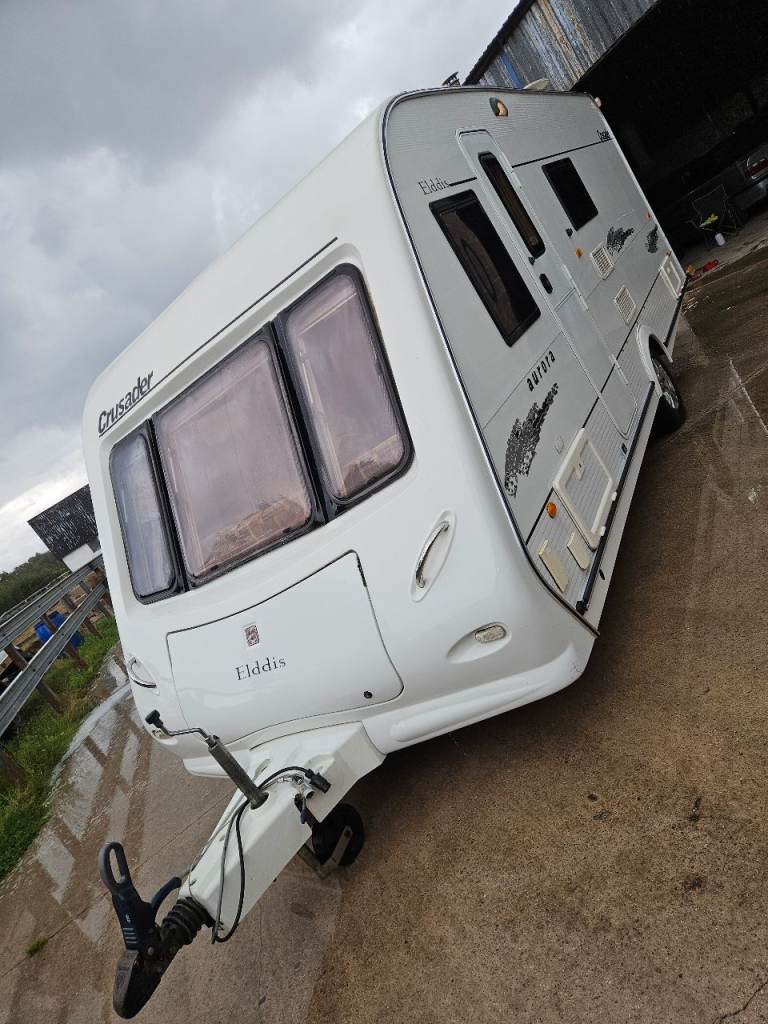 Four berth, transverse fixed bed with motor mover, awning & accessories 