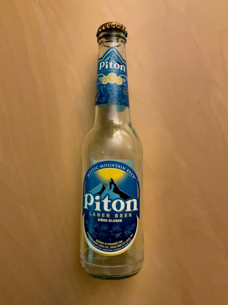AS NEW ST. LUCIA PITON BEER BOTTLE + CAP (Breweriana Labeorphilist)