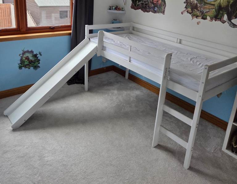 Mid sleeper bed with slide