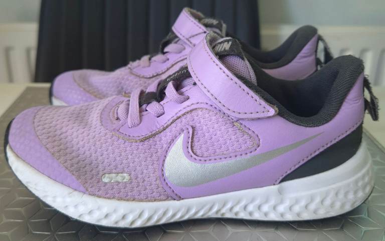 Nike Revolution 5 children's Trainers in a purple and metallic silver colorway size 11