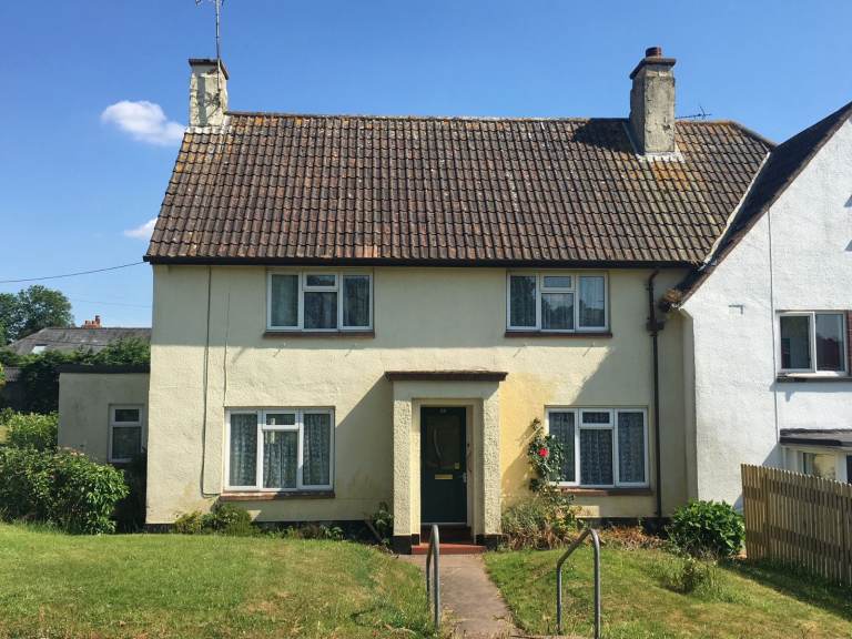 A family size semi detached house with good garden in a popular village