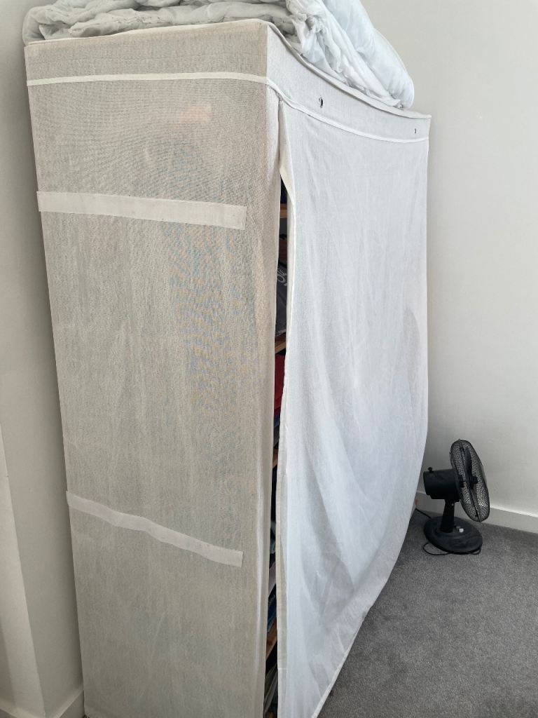 [FREE] White Fabric Wardrobe with Shelves and Hanging Rail