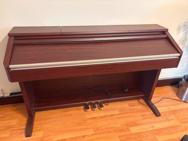 Celviano AP-500 Digital Piano – Good Condition, Dark Wood