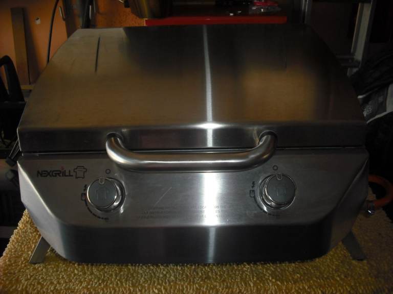 Barbecue, Nexgrill Stainless Steel, gas powered, dual burner for tabletop or portable. 