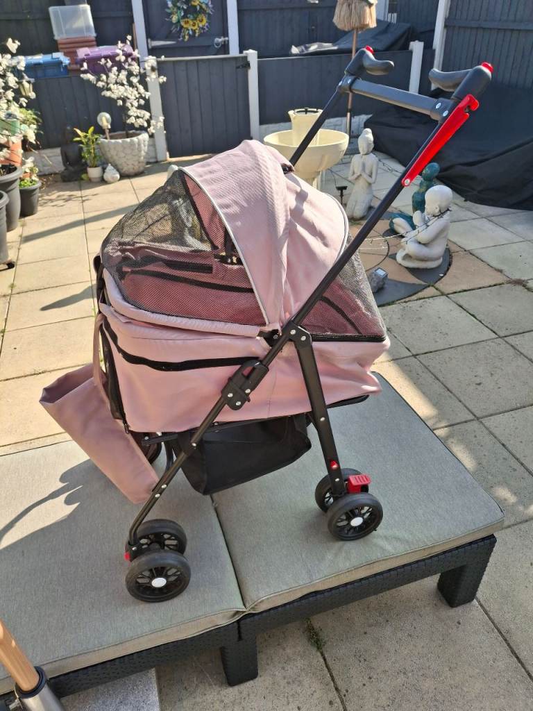 Pink dog pram